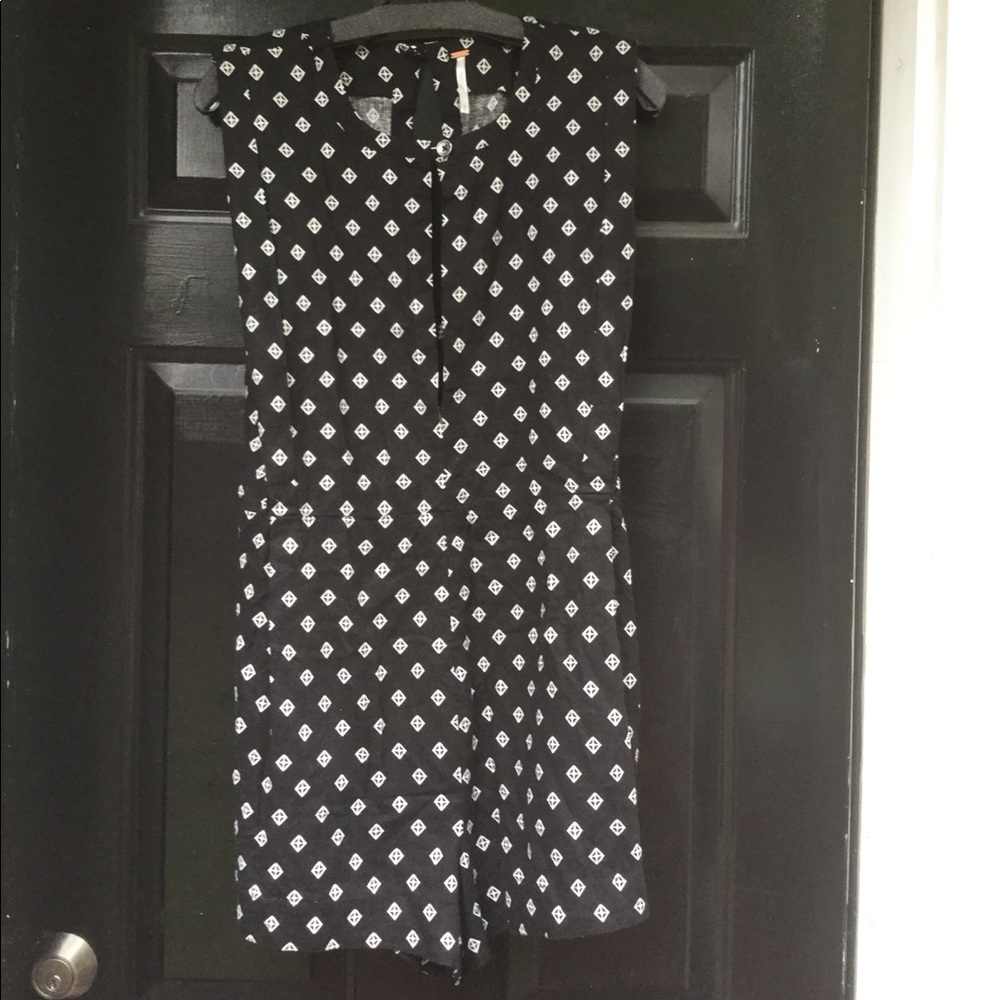 Free People Black & white Romper print. Size M NWT